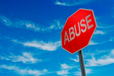 stop sign reads ABUSE